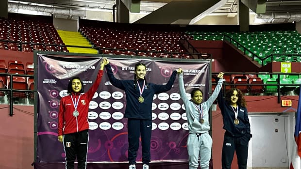 Mia Ortiz-Martinez (far right) joins other wrestlers on the medal stand during the 45 kilo ceremony at the Pan American Games. She was a bronze medalist.